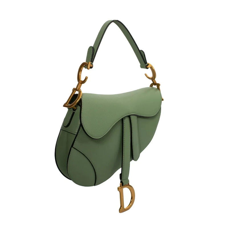 sac de seconde main saddle  dior  en cuir vert côté