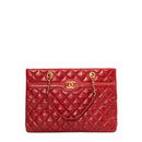 sac de seconde main shopping bag   chanel en cuir rouge  face