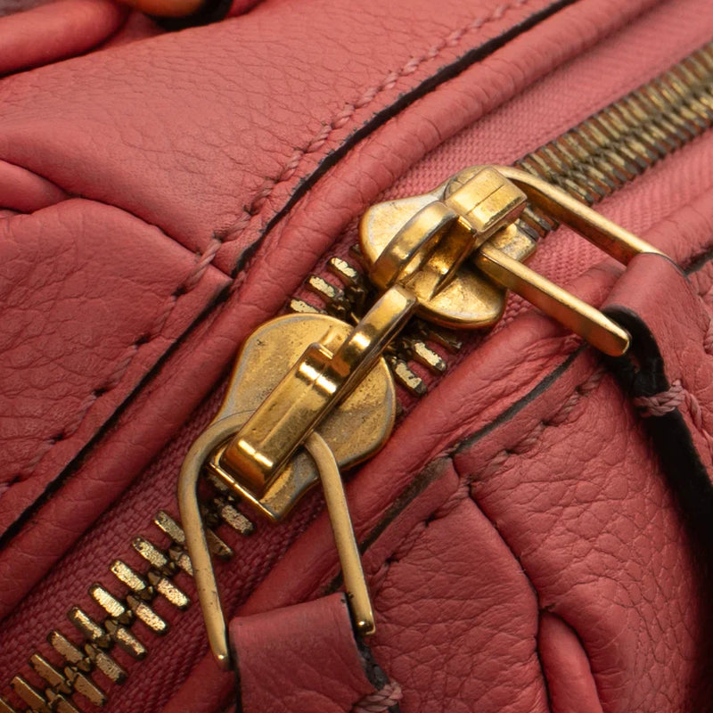 sac de seconde main speedy louis vuitton en cuir empreinte rose défaut 2