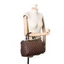 sac de seconde main speedy louis vuitton en toile damier ébène porté