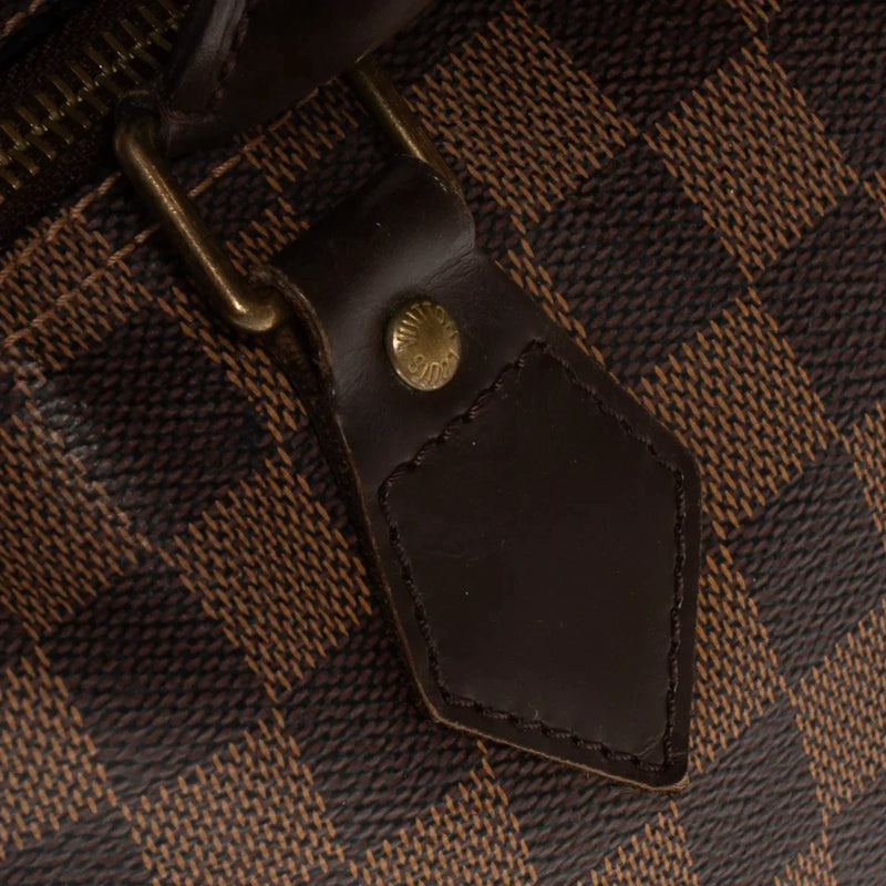 sac de seconde main speedy louis vuitton en toile damier ébène défaut 1