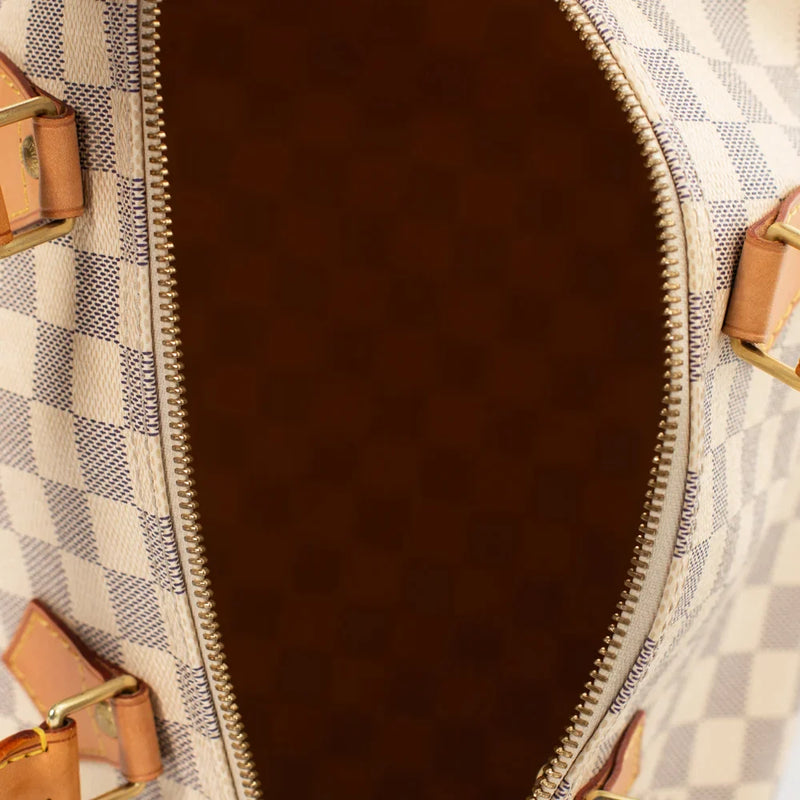 sac de seconde main speedy louis vuitton en toile damier azur intérieur