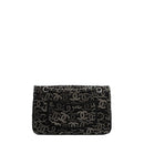 sac de seconde main timeless chanel en toile noir dos