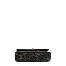 sac de seconde main timeless chanel en toile noir bas