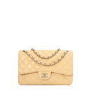 sac de seconde main timeless chanel  en cuir beige face