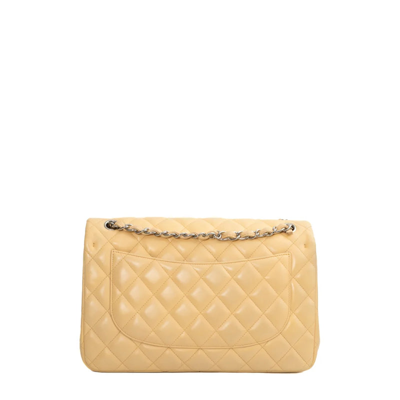 sac de seconde main timeless chanel  en cuir beige dos