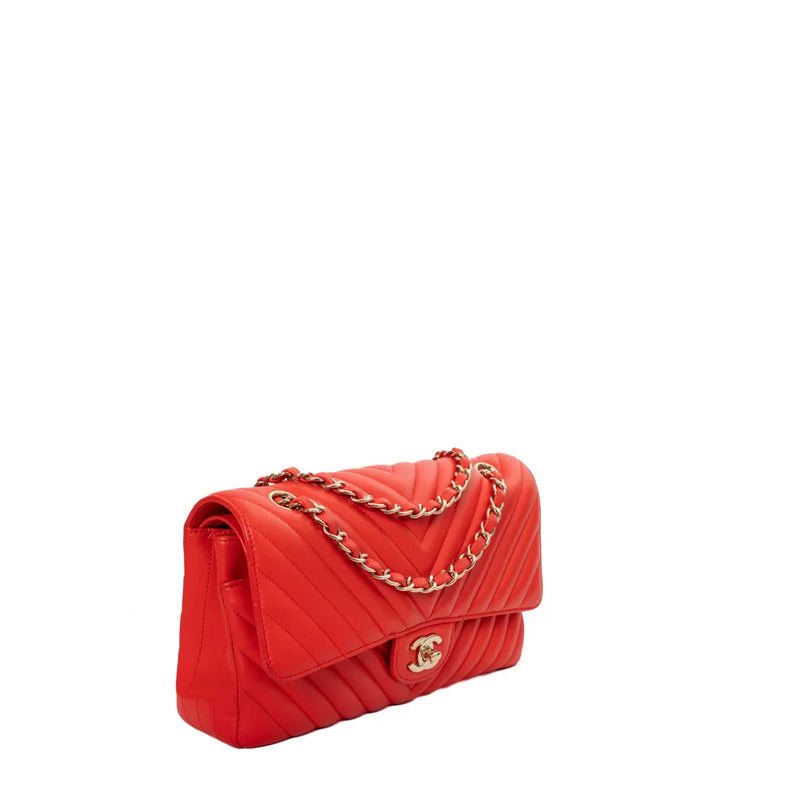 sac de seconde main timeless chanel  en cuir rouge côté